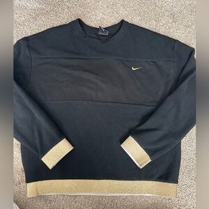 Nike Women’s Black and Gold Fleece Crewneck Sweater